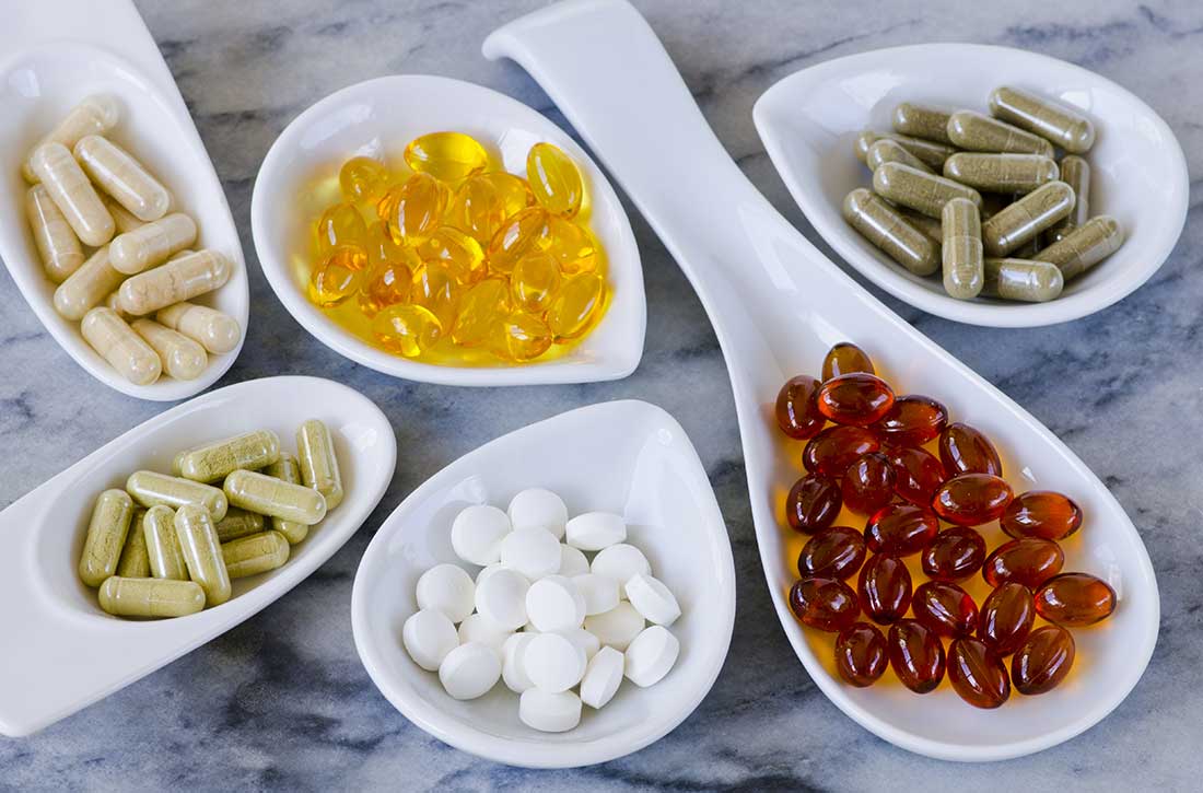 Supplements in dishes on counter