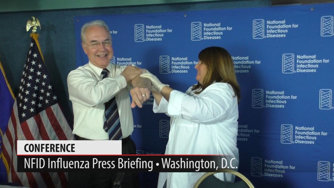 HHS Secretary Tom Price receives a flu vaccine during the press briefing.