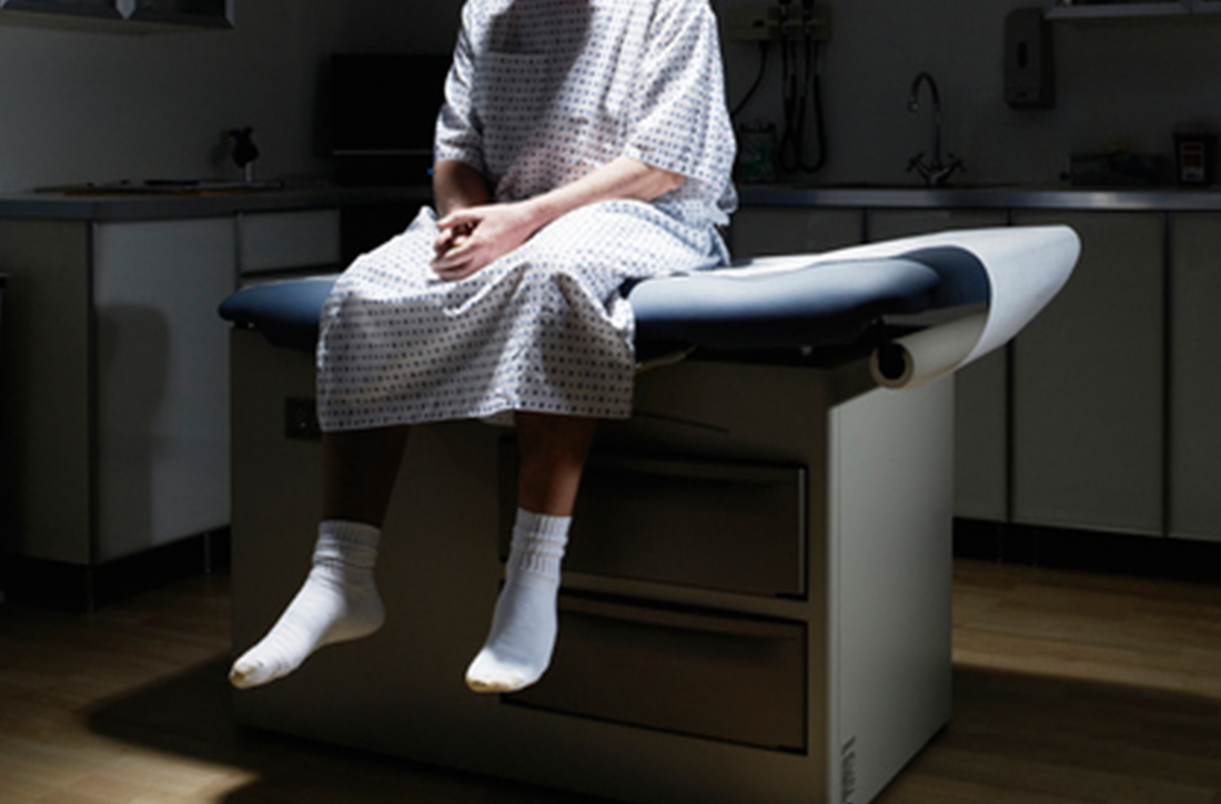 Man sitting on exam table