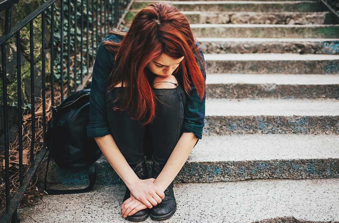 Girl sitting on steps