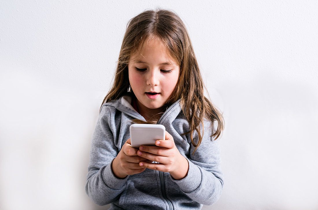 Girl plating with phone