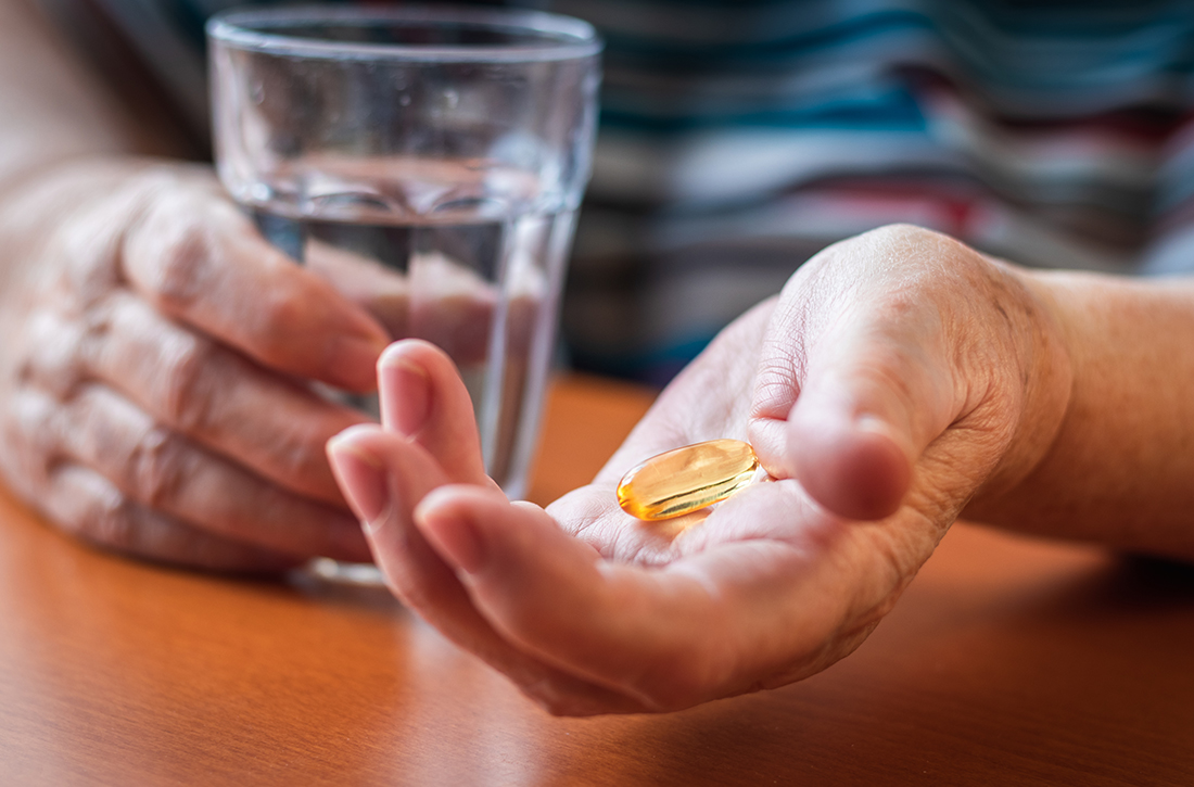 Pills and glass of water