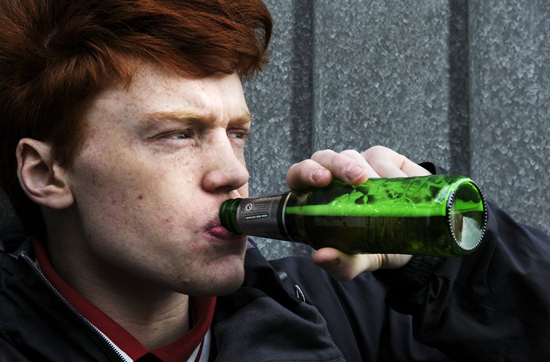 Boy drinking alcohol