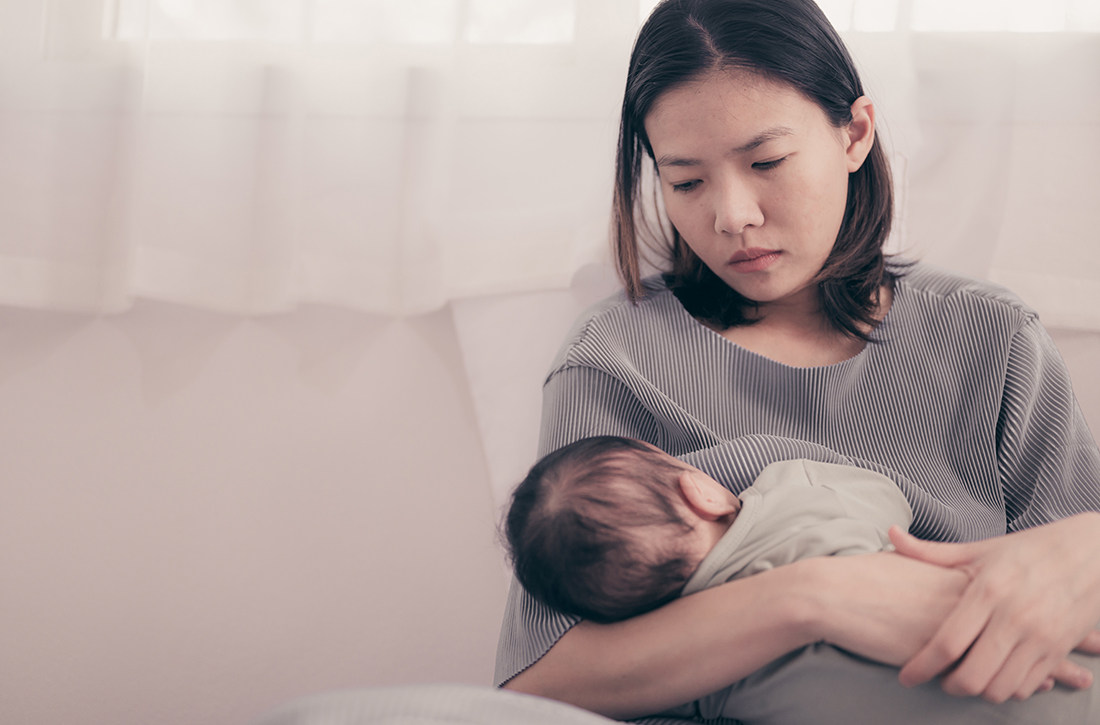 Mom holding baby