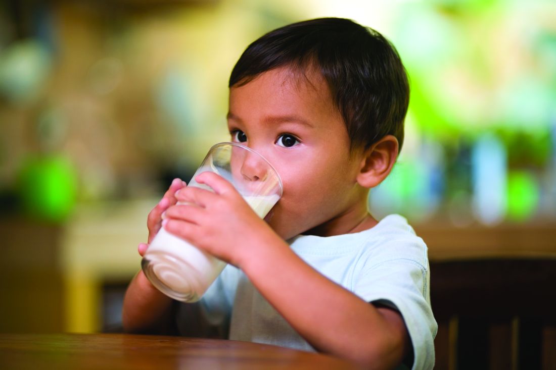 Toddler drinking milk