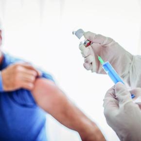 man receiving COVID-19 vaccine