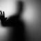 Shadow of man reaching out