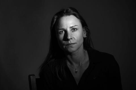 Woman sitting in chair