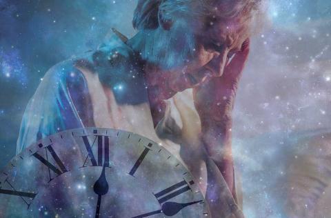 Old woman holding her head with a clock