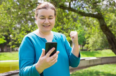 Woman holding iPhone