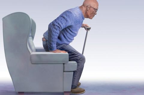 Man trying to stand up with cane