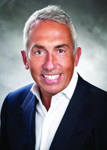 Dr. Charles E. Miller
