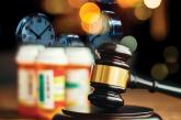 Pill bottles and gavel