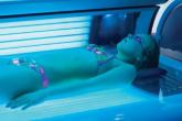 FDA reclassifies tanning beds; warns against use by teens 