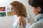 Girl getting HPV vaccine