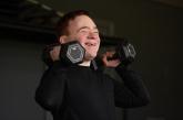 Patient with disabilities lifting weights Patient with disabilities lifting weights
