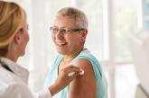 Doctor giving patient vaccine Doctor giving patient vaccine