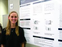 Meredith Johnston, DO, of Eau Claire Cooperative in Columbia, S.C., at her poster at the American Academy of Pediatrics meeting