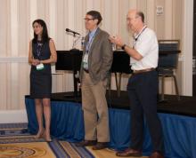 Dr. Rachel Cyrus, Dr. John Nelson (center), and Dr. Mark V.  Williams address attendees during the Sunday Pre-Course