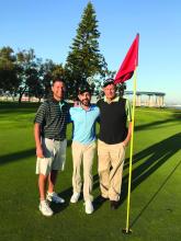 Dr. Benabio with his brother and father on the golf course