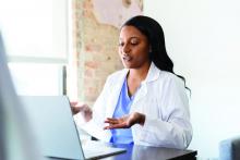 Doctor talking with patient during virtual medical appointment