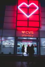 Front of a CVS pharmacy at night