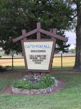 Sign for Camp Discovery, Texas