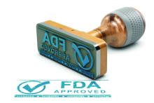 A stamp saying &quot;FDA approved.&quot;