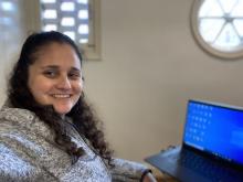 Jessi Gold, MD, gets ready for a telehealth appointment from her home office.