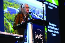 Dr. Jane M. Grant-Kels, founding chair of dermatology at the UConn School of Medicine, Farmington, speaks during the plenary session at AAD 2023.