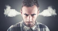 Picture of an angry man, blowing steam out of his ears.