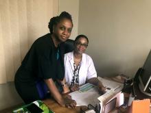 Dr. Catherine Segbefia (L) and Dr. Yvonne Dei-Adomakoh are both hematologists working on sickle cell trials.