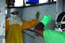 An image of a decontamination procedure during the 2014 West African Ebola hemorrhagic fever outbreak.