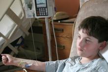 A boy in a hospital bed