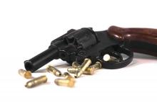 A handgun and bullets