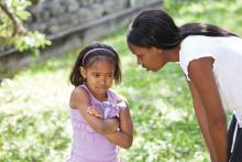 A mother talks to her child.