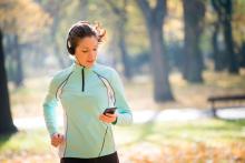 Woman jogging and listening music.