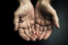 Photo of smudged, open hands