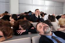 people asleep in lecture hall