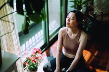 Woman meditating, taking a moment of mindfullness