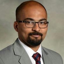 Dr. Aravind Menon