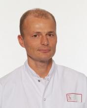 Dr. Gerald Raverot