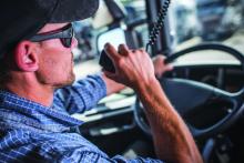 A trucker behind the wheel.