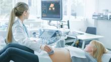 Pregnant Woman Getting Ultrasound / Sonogram Scan