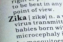 A dictionary page shows the word Zika.