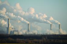 Smoking chimneys of a power plant polluting the air