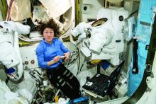 Astronaut Christina Koch performs maintenance on the International Space Station.