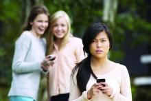 girl getting bullied on cell phone