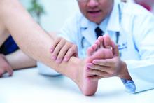 Doctor examining a patient's foot