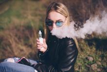 teen girl vaping ecigarette